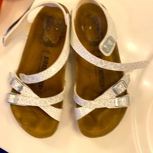 Gently worn Birkenstock sandals silver/white.